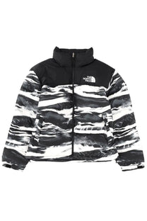 The North Face men’s retro nuptse jacket black and white wave-patterned puffer with black hood and front zipper closure