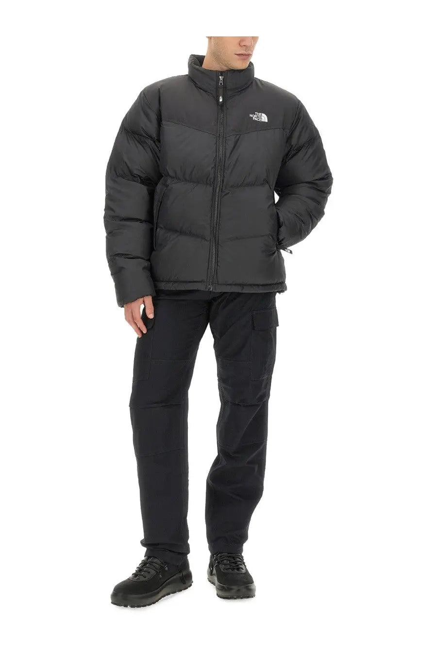 The North Face men’s Saikuru black puffer jacket with quilted design and logo on the chest for cold weather