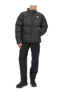 The North Face men’s Saikuru black puffer jacket with quilted design and logo on the chest for cold weather