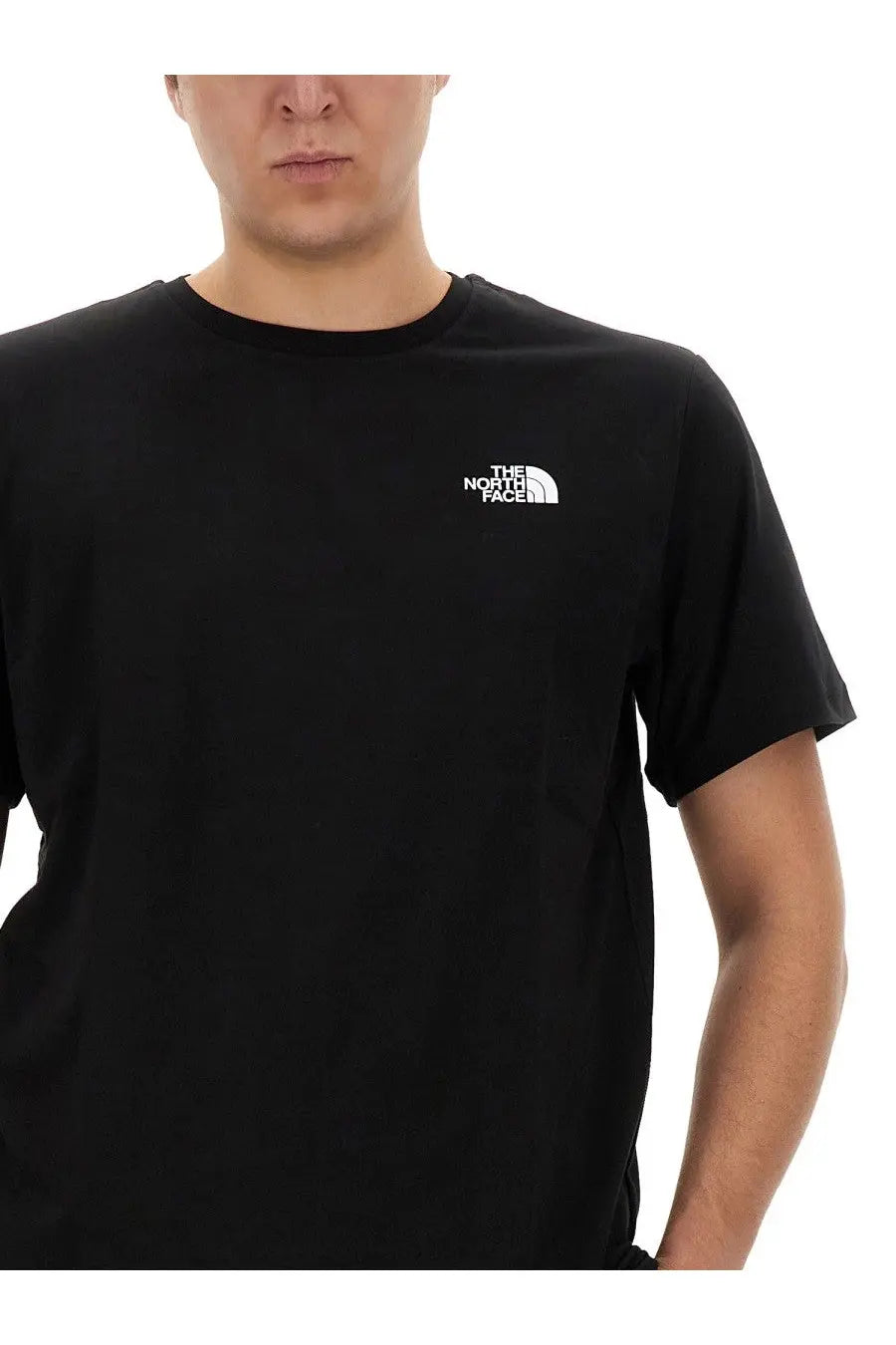 The North Face men’s black short-sleeved t-shirt with a white embroidered logo on the left chest