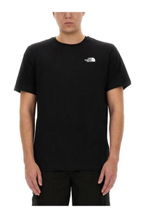 The North Face men’s black short-sleeved t-shirt with a white embroidered logo on the left chest