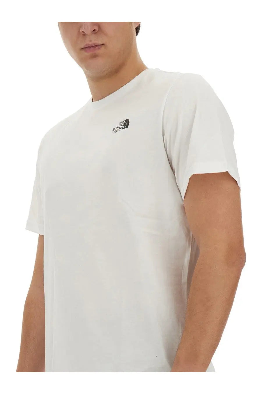 The north face men’s white short-sleeved t-shirt with a small black logo on the left chest front side