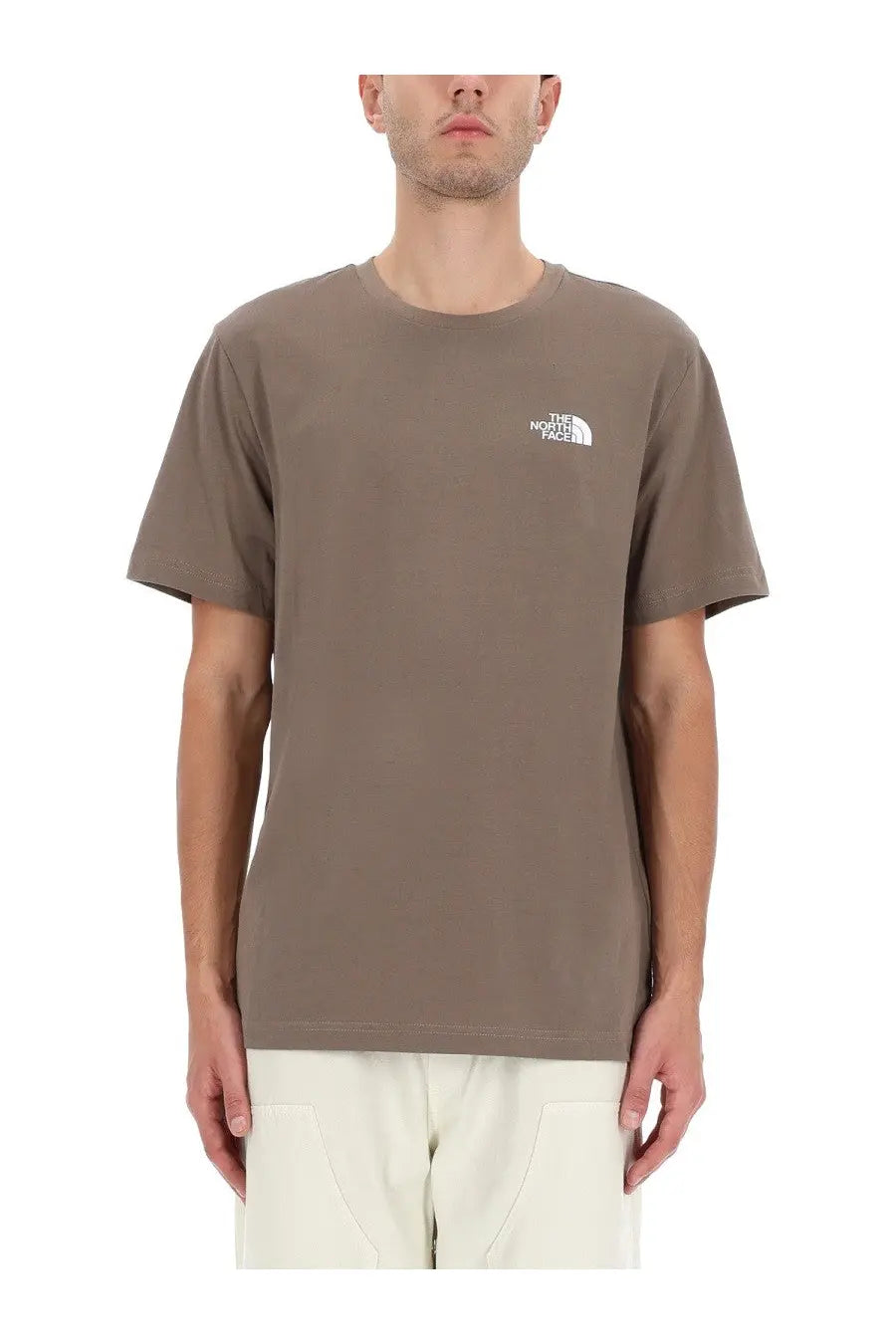 The north face men’s simple dome shirt brown is a muted olive green short-sleeved t-shirt with a small white logo on the chest