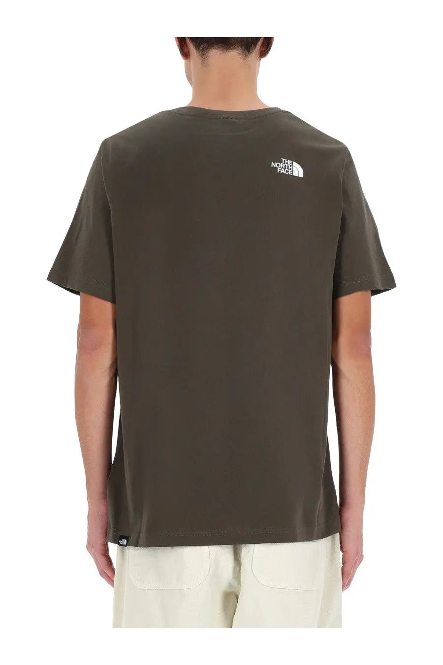 The back of an olive green The North Face men’s simple dome short-sleeved t-shirt with a white embroidered logo