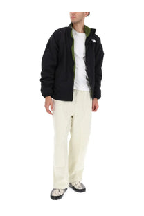 The north face men’s yumiori fleece jacket black with olive green lining and white logo on the chest