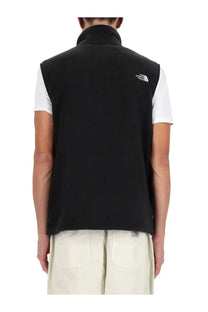 The back side of a black fleece vest with a high collar and the north face logo on the upper back for men