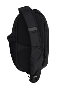 The north face unisex backpack borealis sling black with sleek minimalist design and gray reflective strip on shoulder strap