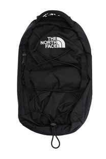 Black the north face unisex backpack borealis sling with white logo and adjustable drawstrings in black color