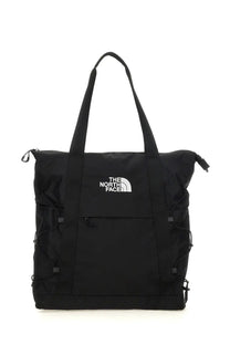 Black the north face unisex borealis tote bag with white logo and adjustable drawstring closure for versatile use
