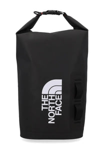 The north face unisex waterproof black dry bag with white logo and side compression straps for outdoor use