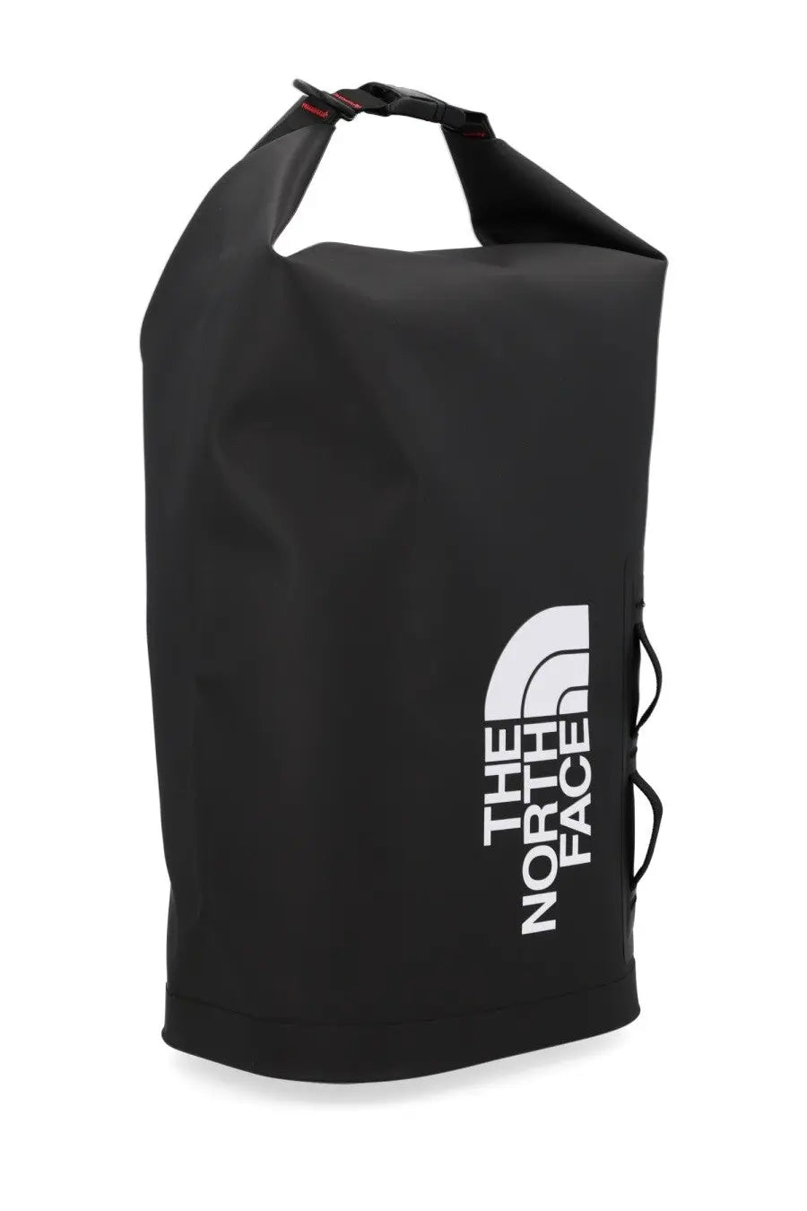 Black waterproof dry bag with red stitching and white The North Face logo for outdoor use by The North Face