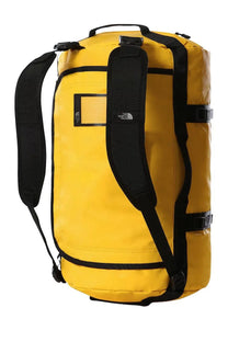 Bright yellow The North Face unisex Base Camp duffel bag with black straps and reinforced stitching