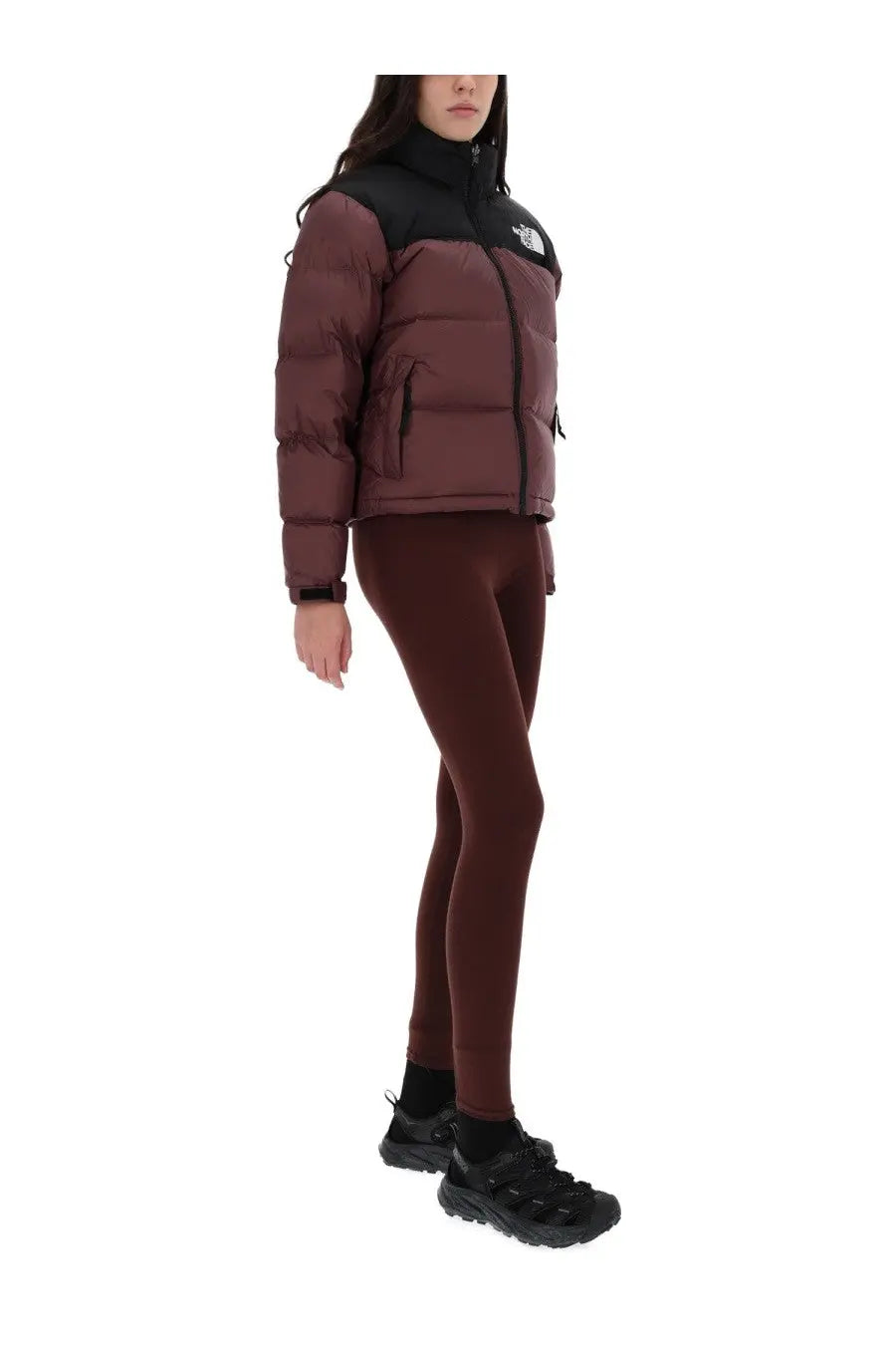 The north face women’s retro nuptse jacket brown with maroon and black quilted puffer design for cold weather