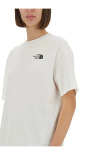 The North Face women’s simple dome oversized white short-sleeved t-shirt with black embroidered logo on left chest