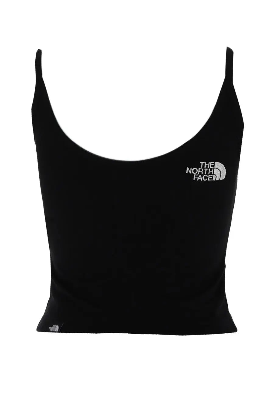 The North Face women’s slim crop top in black with thin straps and a white logo on the chest