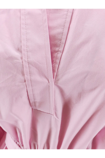 Nude women’s cotton polo dress in soft pink with subtle v-neckline and clean stitching details