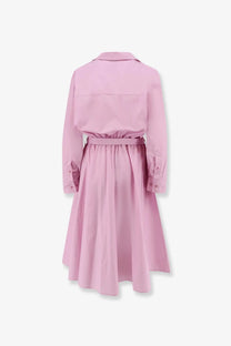 A soft pink cotton trench coat dress with long sleeves and a belted waist for women