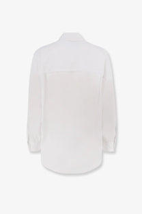 A crisp white long-sleeved cotton shirt for women with a classic collar and subtle seam detailing
