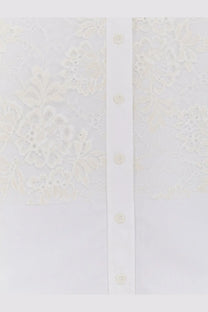 Nude women’s cotton shirt white with a white lace blouse design featuring delicate floral embroidery and matching buttons