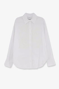 Nude women’s white cotton shirt with a minimalist button-up design and subtle textured pattern with classic collar