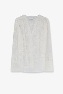 Nude women’s white lace shirt with delicate floral pattern long sleeves and v-neckline in intricate lace material