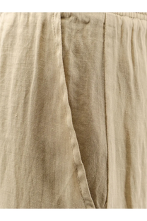 Beige women’s linen blend trousers with relaxed texture and visible seam detailing in a nude green style
