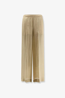 Nude women’s linen blend trousers in beige with wide legs elastic waistband and lightweight flowing fabric