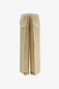 Nude women’s linen blend wide-leg trousers in beige with elastic waistband and two front pockets
