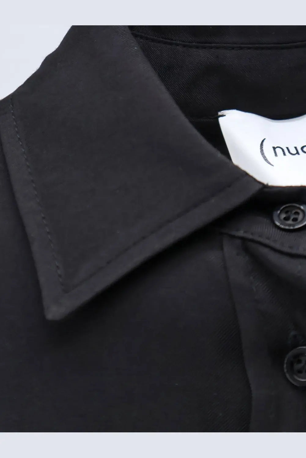 Black viscose collared shirt for women featuring subtle texture and matching black buttons from Nude collection