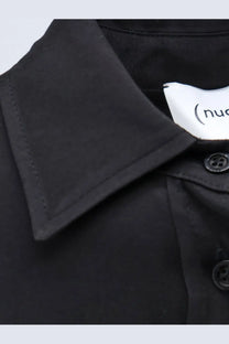 Black viscose collared shirt for women featuring subtle texture and matching black buttons from Nude collection
