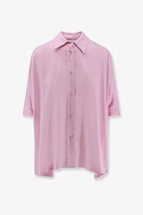 A soft pink oversized button-down viscose shirt for women with a relaxed fit and subtle sheen