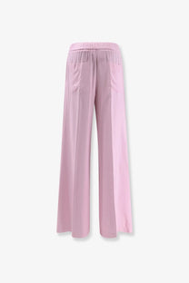 Nude women’s viscose soft pink wide-leg trousers with elastic waistband and two front pockets