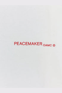 Red peacemaker oamc logo printed on white cotton oamc peacemaker men’s shirt with keys print