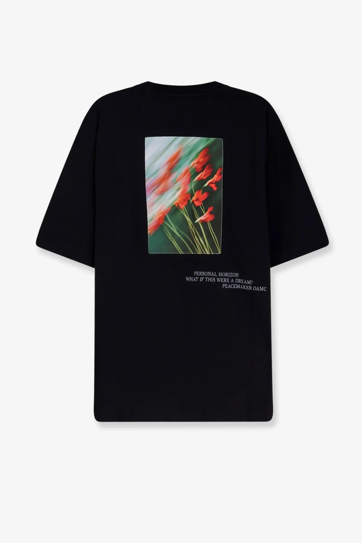 Black oversized cotton t-shirt by Oamc featuring red flower graphic print with white text on front for men