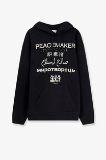 Oamc peacemaker men’s black cotton hoodie with white text, multilingual translations, front pocket, and drawstrings