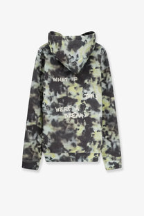 Back of oamc peacemaker men’s cotton sweatshirt in black and pale green tie dye with white graffiti style text