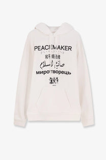 Oamc Peacemaker men’s white off-white cotton hooded sweatshirt with bold black multilingual text across the chest
