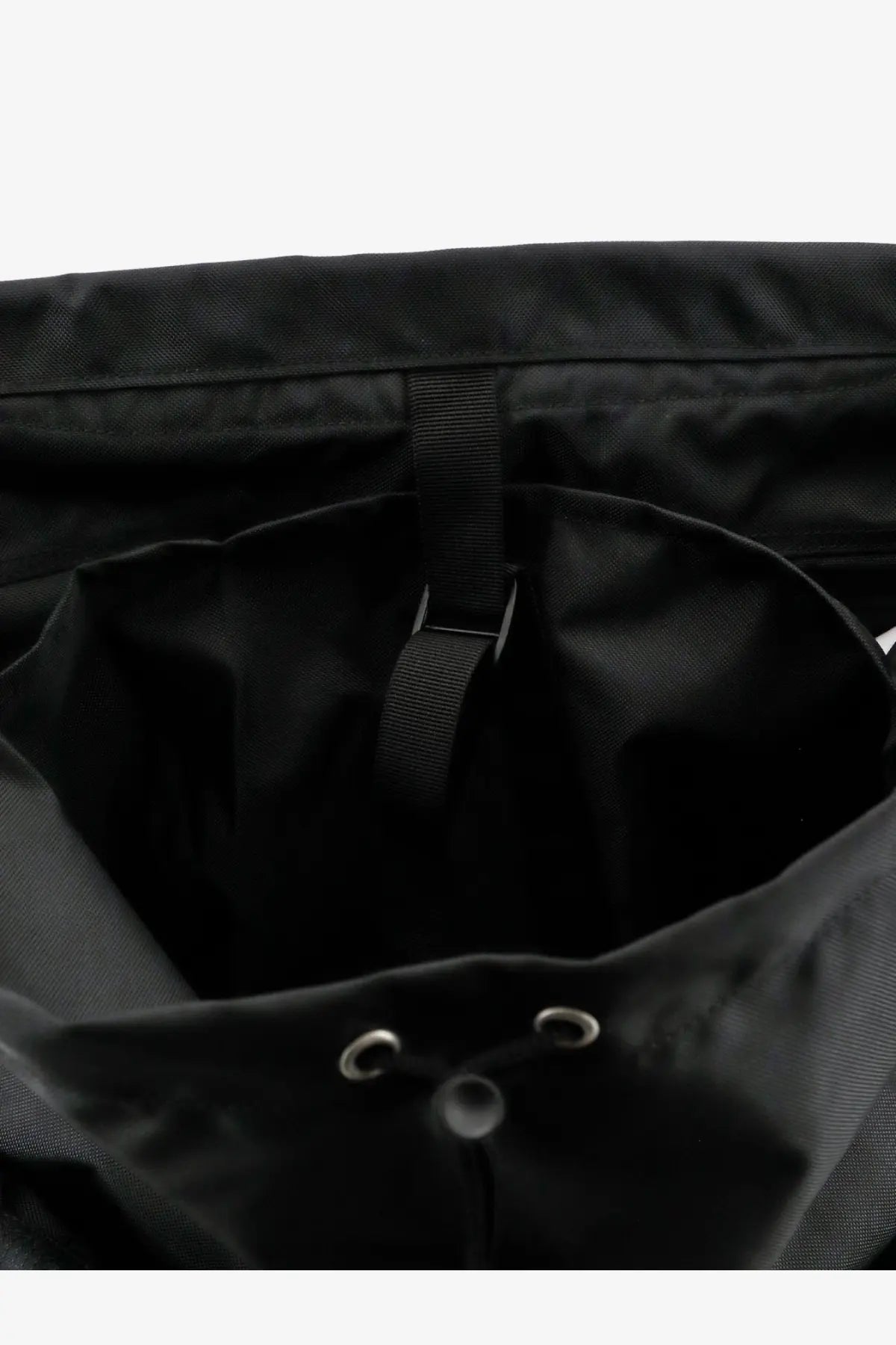 Black drawstring Oamc Peacemaker men’s jungle nylon backpack with reinforced stitching and metal eyelets