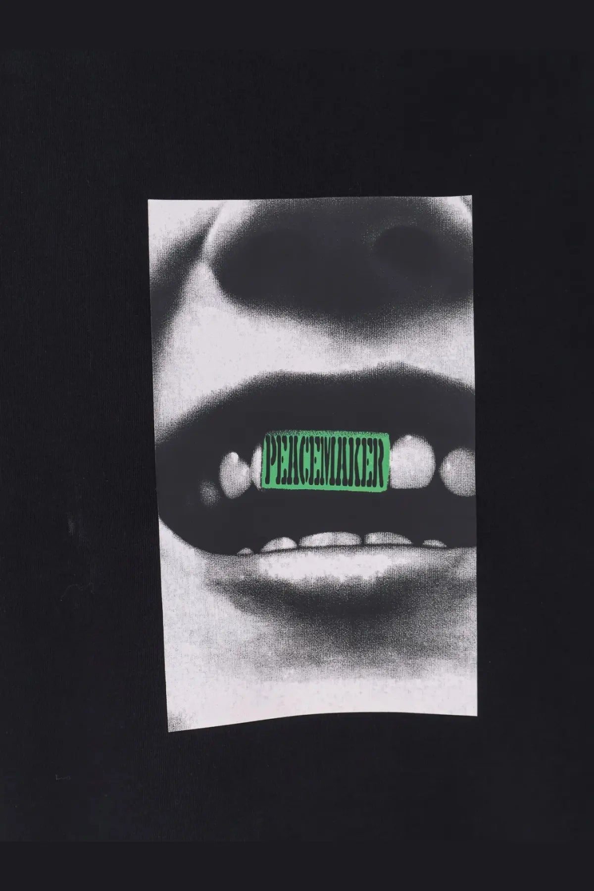 Oamc peacemaker men’s loose fit black crewneck sweatshirt with high contrast lips smile graphic and bright green label
