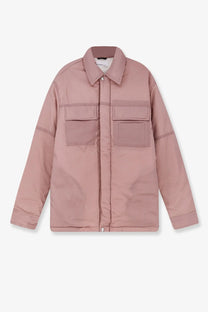 A soft rose-pink quilted jacket with classic collar front patch pockets and button closures from Oamc Peacemaker