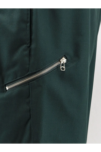 Dark green oamc peacemaker men’s virgin wool trousers with a sleek silver zipper and metallic pull tab