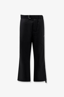 Oamc Peacemaker men’s black wide-leg wool blend trousers with sleek modern design and subtle white stitching details