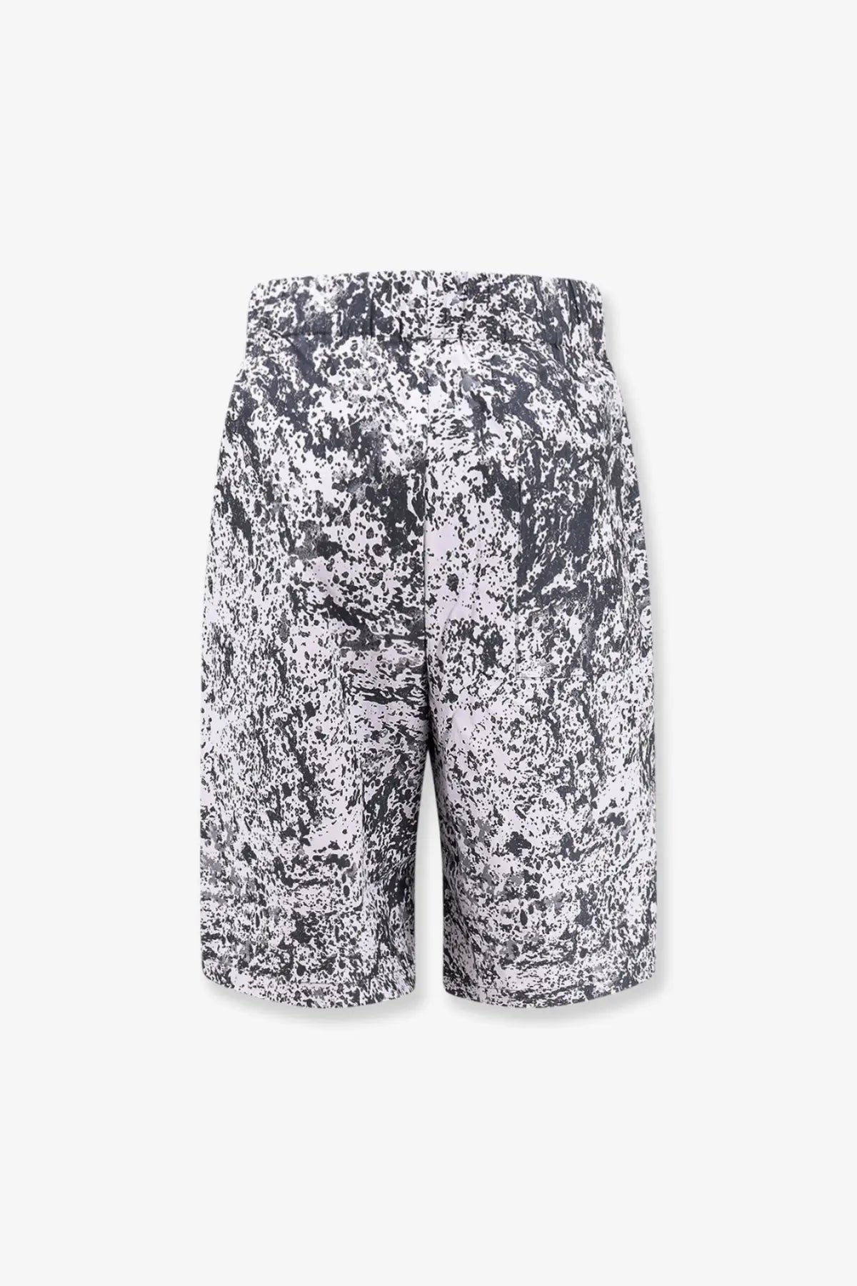 Oamc peacemaker men’s vapor bermuda shorts in black and white abstract splatter pattern with lightweight fabric