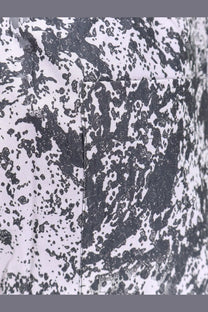 Oamc peacemaker men’s vapor bermuda shorts with white and black splatter pattern and stitched back pocket