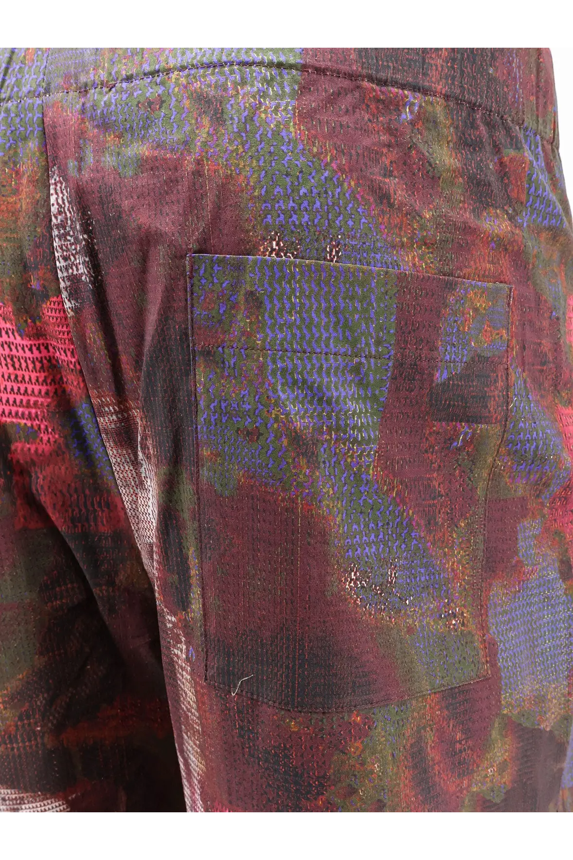Oamc Peacemaker men’s vapor cotton bermuda shorts with multicolored textured patchwork in red purple and green