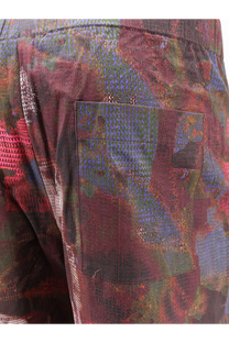 Oamc Peacemaker men’s vapor cotton bermuda shorts with multicolored textured patchwork in red purple and green