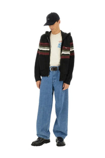Black and maroon striped knit hoodie with white accents paired with obey men’s bigwig baggy jeans blue front view