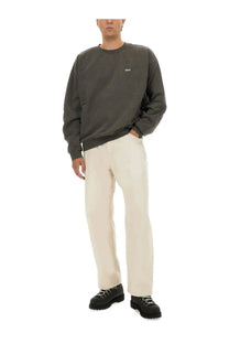 Dark olive green obey men’s cotton sweatshirt with small white logo on chest in black style
