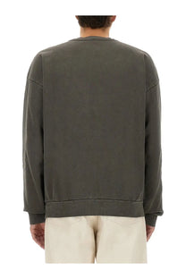 Olive green oversized cotton crewneck sweatshirt with relaxed fit and ribbed cuffs from obey mens collection