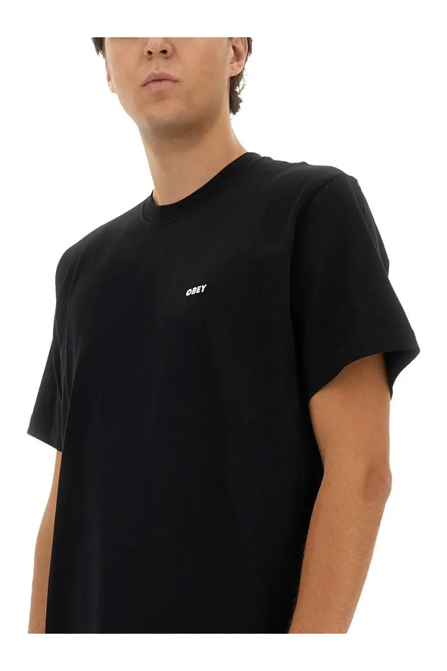 Obey men’s black short-sleeved t-shirt with small white embroidered obey logo on the left chest